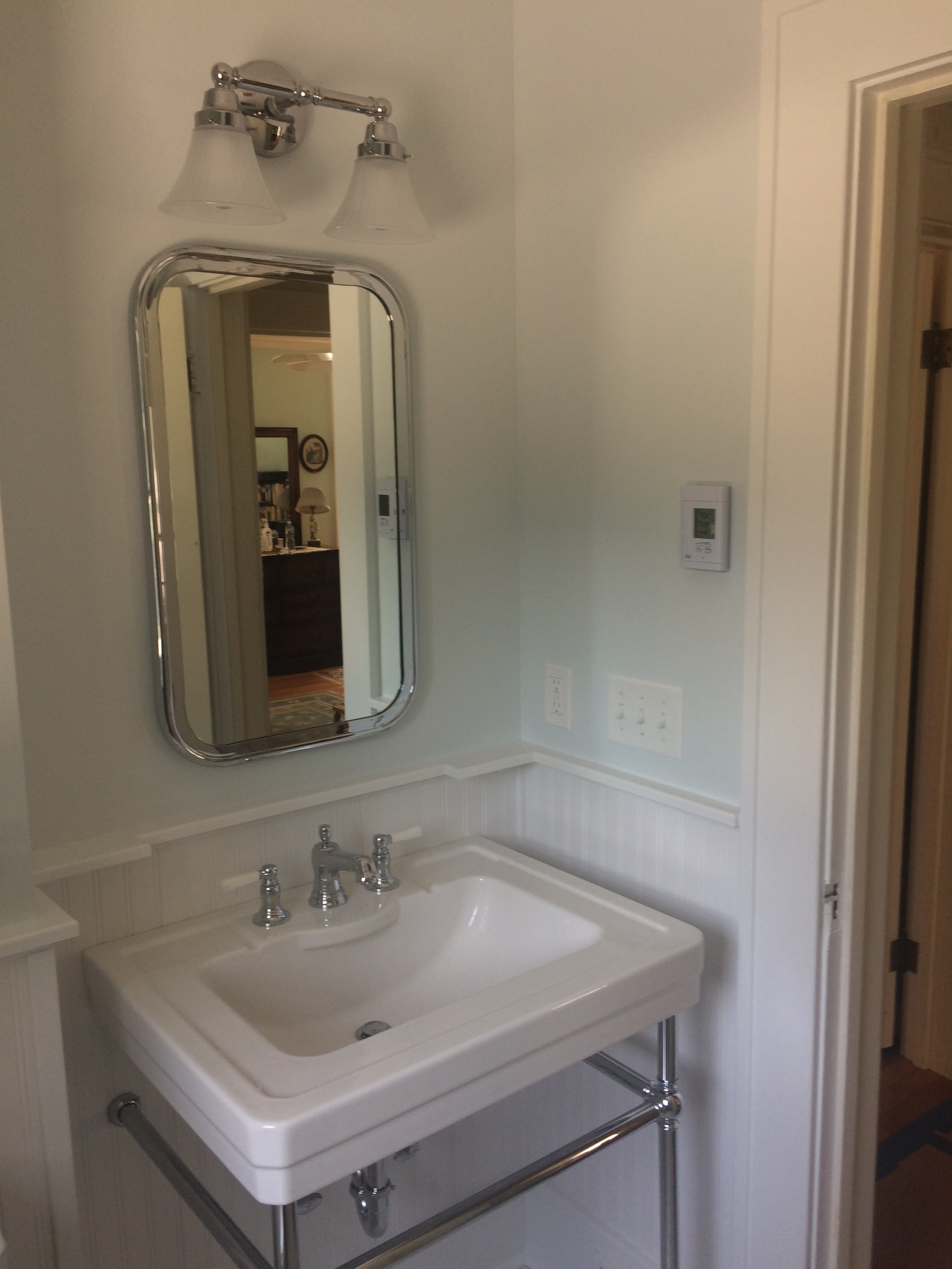 Niskayuna 2 bathroom remodel - wide vanity view with pedestal sink, chrome mirror, and hex tile