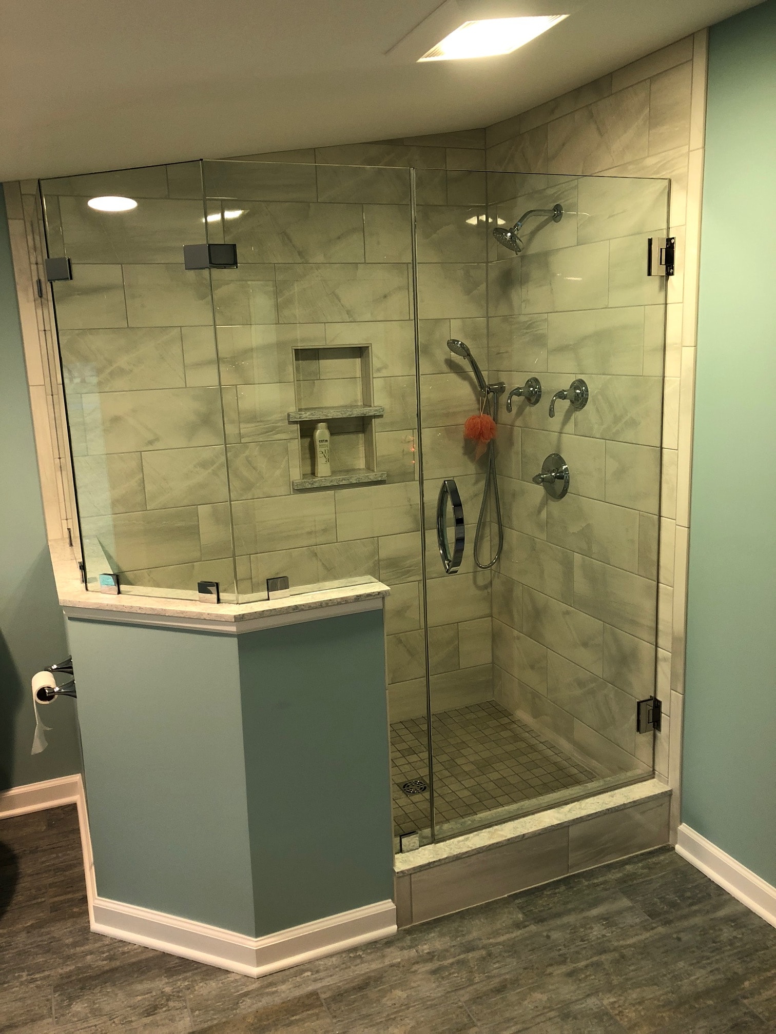 Saratoga Lake bathroom remodel - full shower layout with marble wall tile and wood-look floor
