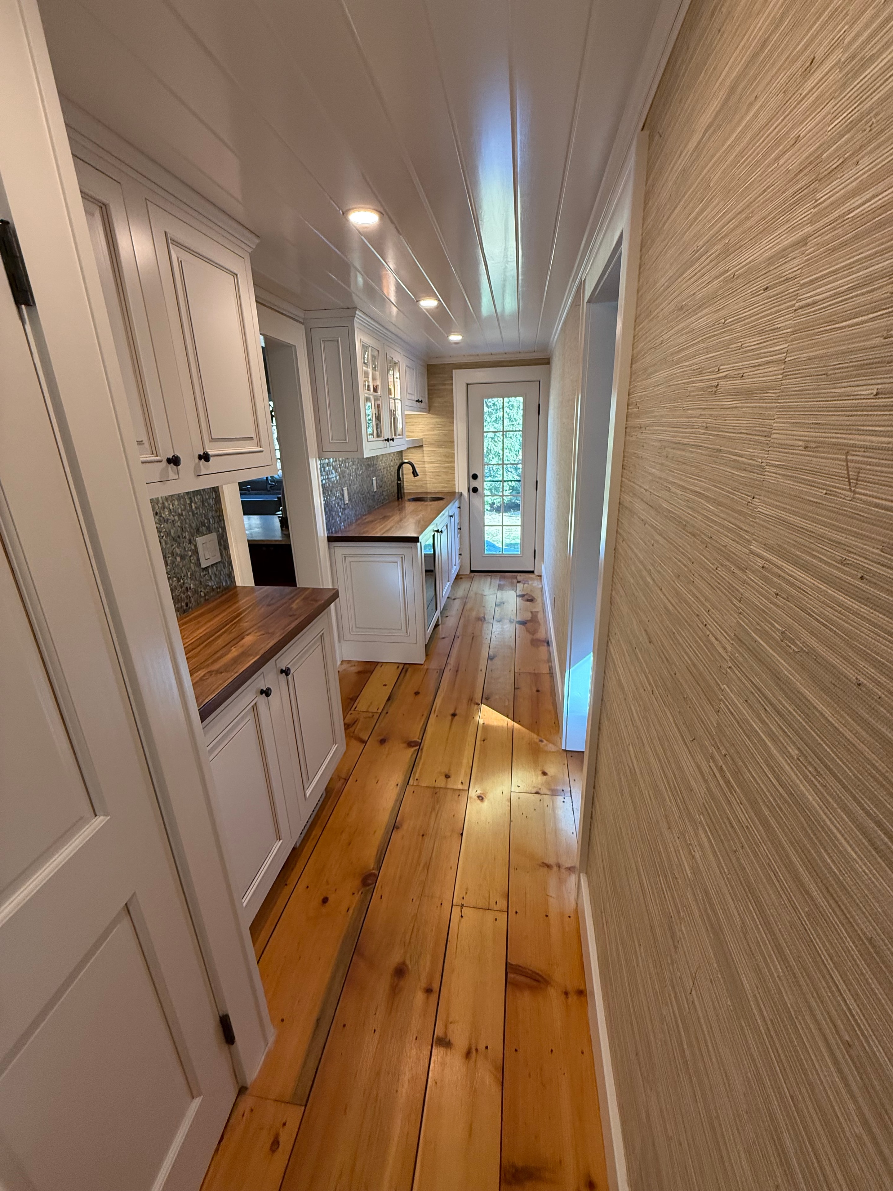 Coffee nook - wide angle showing full nook with knotty pine accent wall